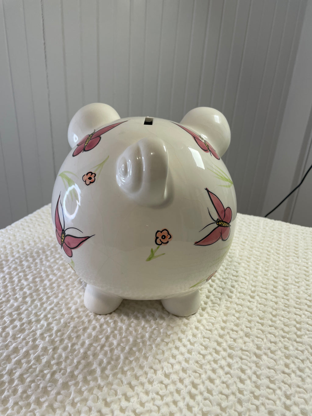 Hand-painted ceramic piggy bank